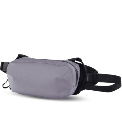 Поясная сумка WANDRD D1 Fanny Pack Фиолетовая  Объём :	2 л • Материал :	нейлон, брезент • Особенности конструкции :	водоотталкивающее покрытие