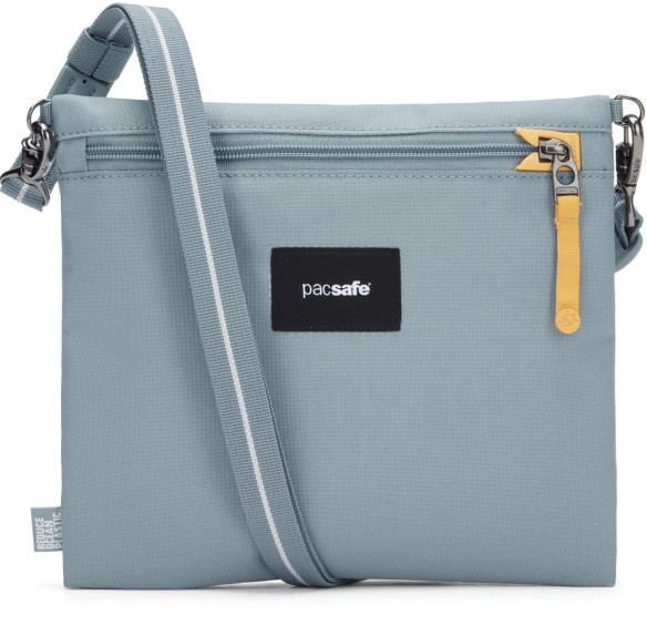 Сумка антивор Pacsafe GO crossbody pouch, мятный, 3,5 л.  Диагональ 7 дюйма • Объем: 3,5 л • Защитная ткань от RFID уязвимости • Блокиратор язычка молнии • Блокировка ремня с поворотным замком • Вшитые в лямку стальные стропы