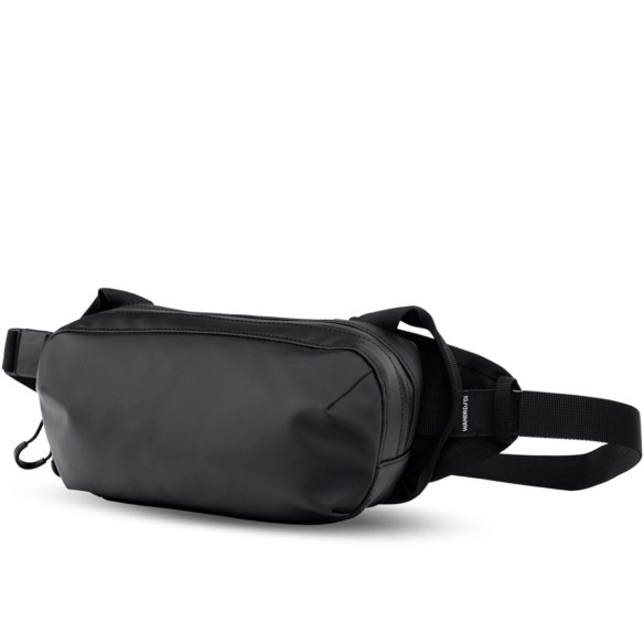 Поясная сумка WANDRD D1 Fanny Pack Чёрная  Объём :	2 л • Материал :	нейлон, брезент • Особенности конструкции :	водоотталкивающее покрытие